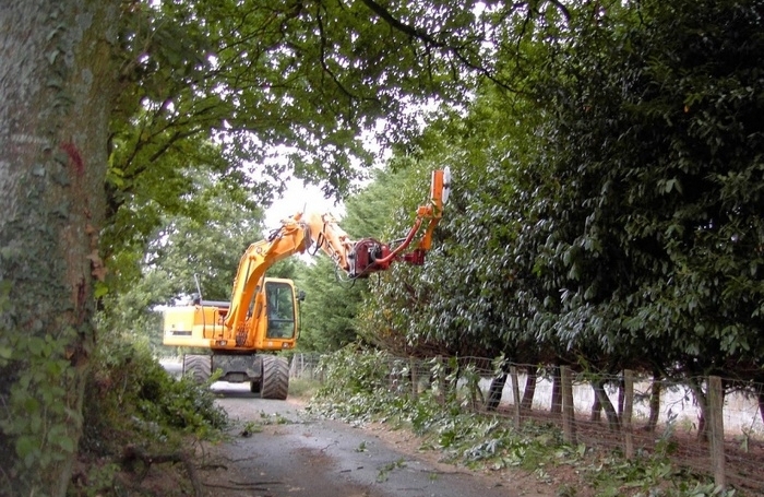 Сменный дисковый кусторез на экскаватор
